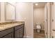 Bathroom features granite counters, double sinks and toilet room with a new toilet at 311 Bianca Way, Mcdonough, GA 30253