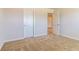 Neutral bedroom features carpet and new paint, great for a restful personal space at 311 Bianca Way, Mcdonough, GA 30253