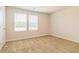 Cozy bedroom features neutral carpeting, fresh paint and dual windows for ample light at 311 Bianca Way, Mcdonough, GA 30253