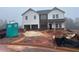 New two-story home shows off a modern exterior, awaiting landscaping and final touches at 311 Bianca Way, Mcdonough, GA 30253