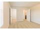 Main bedroom with two open doors leading to the bathroom and walk-in closet at 311 Bianca Way, Mcdonough, GA 30253