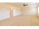 Bright primary bedroom featuring plush carpeting and ample natural light at 311 Bianca Way, Mcdonough, GA 30253