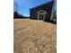 Spacious backyard offers plenty of room for outdoor activities and future landscaping possibilities at 106 Henley St, Canton, GA 30114