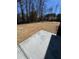 Spacious backyard featuring newly installed sod, ready for outdoor entertaining and landscaping at 106 Henley St, Canton, GA 30114