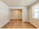Living Room featuring beautiful hardwood flooring, neutral paint, and bright natural light at 106 Henley St, Canton, GA 30114