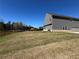 Spacious backyard with a fence, offering privacy and room for outdoor activities at 1641 Fuma Leaf Way, Mcdonough, GA 30253