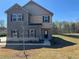 Charming two-story home with a brick and siding exterior, featuring a well-manicured lawn at 1641 Fuma Leaf Way, Mcdonough, GA 30253