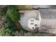 Aerial view of a home, deck with outdoor furniture, greenery, and a driveway at 833 E Morningside Ne Dr, Atlanta, GA 30324