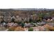 Stunning aerial view showcasing the charming neighborhood and the distant city skyline at 833 E Morningside Ne Dr, Atlanta, GA 30324