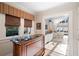 Entertain in style with a built-in bar featuring a dark wood cabinet and sleek countertop at 833 E Morningside Ne Dr, Atlanta, GA 30324
