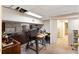 Basement workshop area with concrete floor, tools, and access to a doorway at 833 E Morningside Ne Dr, Atlanta, GA 30324