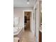 Bright bathroom featuring stand alone tub, walk-in closet, and neutral paint at 833 E Morningside Ne Dr, Atlanta, GA 30324