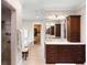 Bathroom featuring double vanity, walk-in closet, stand alone shower, and stand alone tub at 833 E Morningside Ne Dr, Atlanta, GA 30324