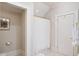 Bright bathroom features a shower with a white curtain and an adjacent toilet area at 833 E Morningside Ne Dr, Atlanta, GA 30324
