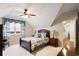 Cozy bedroom with a sloped ceiling, traditional furnishings, and plenty of natural light at 833 E Morningside Ne Dr, Atlanta, GA 30324