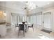 Bright breakfast nook features vaulted ceilings, a ceiling fan, and views from every window at 833 E Morningside Ne Dr, Atlanta, GA 30324