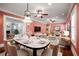 Elegant dining room flowing into the living space, perfect for entertaining guests and Gathering at 833 E Morningside Ne Dr, Atlanta, GA 30324