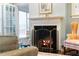 Close up on the fireplace featuring a marble mantle and an elegant fire screen at 833 E Morningside Ne Dr, Atlanta, GA 30324
