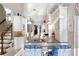 Bright kitchen features white cabinets, granite counters, a breakfast bar, and stainless appliances at 833 E Morningside Ne Dr, Atlanta, GA 30324