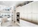 Contemporary kitchen boasts generous storage, stainless steel appliances, and tons of natural light at 833 E Morningside Ne Dr, Atlanta, GA 30324