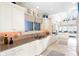 Well-lit kitchen featuring custom cabinets, granite countertops, and stainless-steel sink at 833 E Morningside Ne Dr, Atlanta, GA 30324