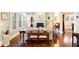 Spacious living room with a fireplace, hardwood floors, and classic decor elements at 833 E Morningside Ne Dr, Atlanta, GA 30324