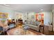 Inviting living room with hardwood floors, elegant furnishings, and access to other living areas at 833 E Morningside Ne Dr, Atlanta, GA 30324