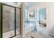 Bathroom features glass shower and soaking tub at 138 Henley St, Canton, GA 30114