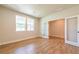 Bedroom with hardwood floors, natural light and view to the adjacent office at 138 Henley St, Canton, GA 30114