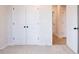 Bedroom with carpet and double door closet at 138 Henley St, Canton, GA 30114