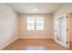 Bright bedroom with hardwood floors and large windows providing natural light at 138 Henley St, Canton, GA 30114