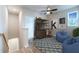 Upstairs bonus room featuring ample space, natural light, and a ceiling fan at 138 Henley St, Canton, GA 30114