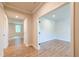 Hardwood floors that leads to another bright room at 138 Henley St, Canton, GA 30114