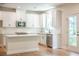 Bright kitchen featuring stainless steel appliances, stone countertops and white cabinets at 138 Henley St, Canton, GA 30114