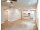 Inviting living room with hardwood floors, recessed lighting, and access to the kitchen at 138 Henley St, Canton, GA 30114