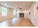 Spacious living room with fireplace, ceiling fan and hardwood floors at 138 Henley St, Canton, GA 30114