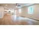 Spacious living room with hardwood floors that opens to the kitchen at 138 Henley St, Canton, GA 30114