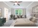 Bright main bedroom features natural light, neutral tones, and stylish decor at 138 Henley St, Canton, GA 30114