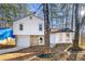 Charming home with stone accents, a well-manicured lawn, and inviting curb appeal at 708 Martin Rd, Stone Mountain, GA 30088