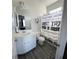 Clean bathroom featuring a shower, stylish vanity with ample counter space and storage at 5257 Shorthorn Way, Powder Springs, GA 30127