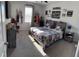 Bright bedroom featuring two beds, carpeted floors, and ample decor at 5257 Shorthorn Way, Powder Springs, GA 30127