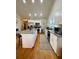 Bright kitchen, granite countertops, stainless steel appliances at 91 Morris Brown Sw Dr, Atlanta, GA 30314