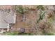 Aerial view of the backyard with a fire pit, a storage shed, and a wooden fence at 91 Morris Brown Sw Dr, Atlanta, GA 30314