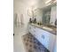 Elegant bathroom featuring double vanities, granite countertops, and modern fixtures at 91 Morris Brown Sw Dr, Atlanta, GA 30314