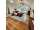 Warm primary bedroom featuring vaulted ceilings, hardwood floors, and large windows at 91 Morris Brown Sw Dr, Atlanta, GA 30314