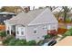 Gray painted brick home with an addition, mature landscaping, and new roof at 91 Morris Brown Sw Dr, Atlanta, GA 30314