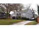 Well-maintained single-story home with a driveway and manicured landscaping at 91 Morris Brown Sw Dr, Atlanta, GA 30314