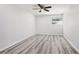 Spacious bedroom featuring a ceiling fan and a large window at 5400 Roswell Rd # C3, Atlanta, GA 30342