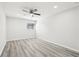 Clean bedroom with hardwood floors and a bright window at 5400 Roswell Rd # C3, Atlanta, GA 30342
