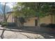 Exterior photo highlighting the building's well-maintained facade, mature trees, and surrounding greenery at 5400 Roswell Rd # C3, Atlanta, GA 30342